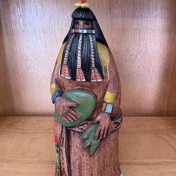 This item is a hand-carved Hopi kachina doll.  It is identified from its inscription as the "Long Hair" katsina.