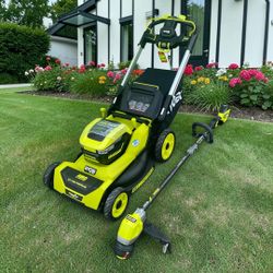 New Ryobi 21inch AWD self propelled mower w weedeater bundle
