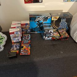 $ 600 3 Prismatic, 1 surging spark booster pack, 1 black bolt elite trainer box (etb) 2 black bolt booster bundles 1 mega evolution lacatio elitle tra