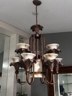 9-light chandelier with a Tuscan/Mediterranean-inspired design