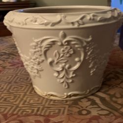 Vintage Italian White Pottery Floral Leaf Planter Indoor Ceramic Plant Pot.6 inches tall and 7 1/2 inches wide. Sells online for 25.00.
