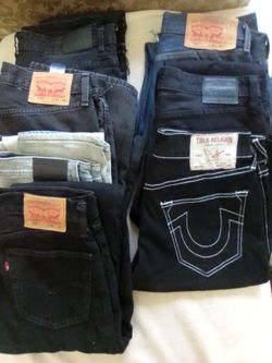 7 PAIRS OF LEVI JEANS/ TRUE RELIGION SHORTS