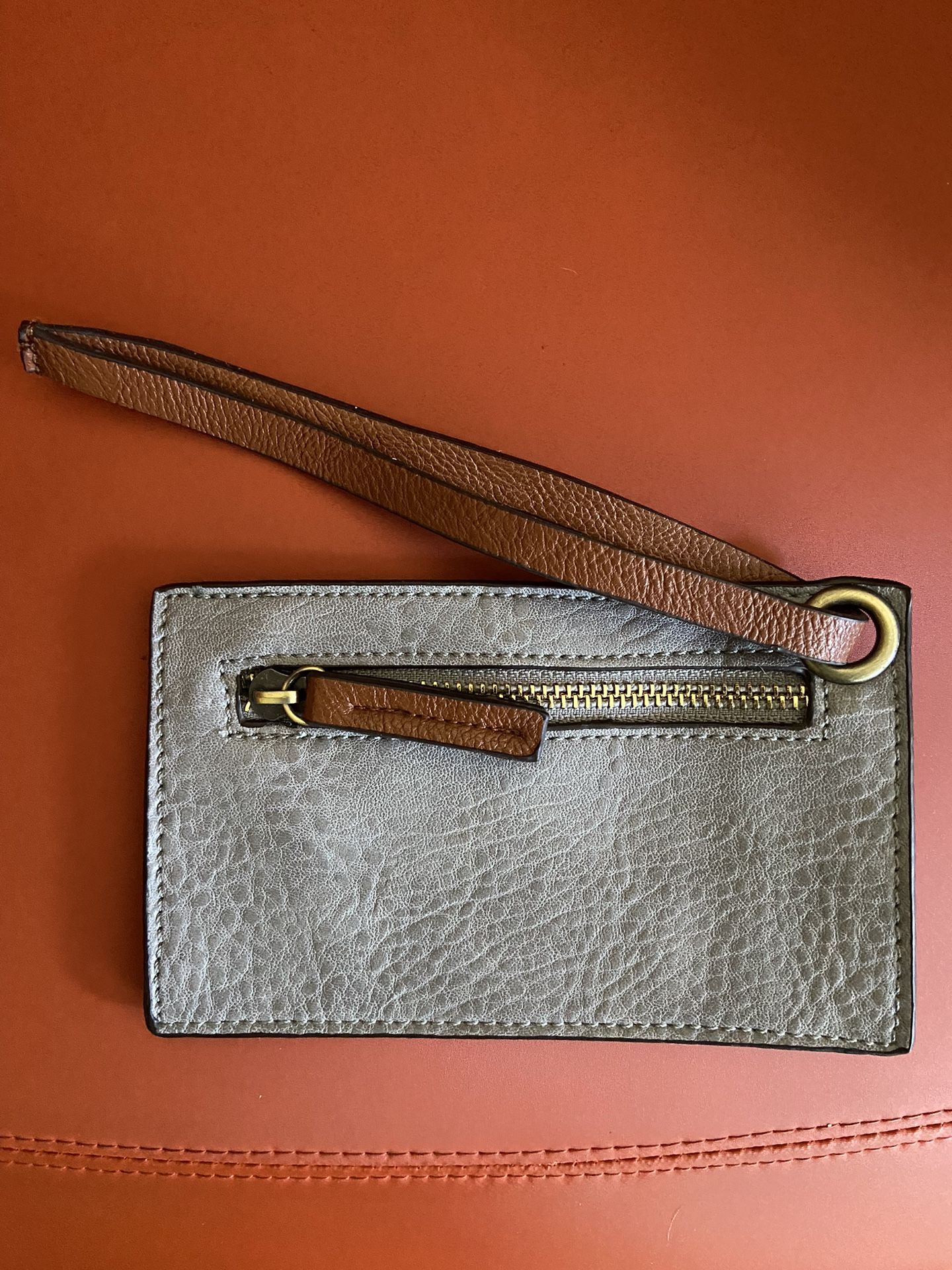 Small gray wristlet