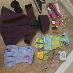 American girl doll lot.  Everything included is American girl doll brand.  Includes the winter jacket hat and mitten outfit