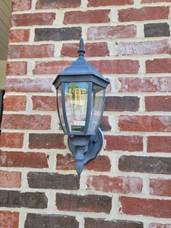 3 Garage light fixtures and 1 porch light fixture