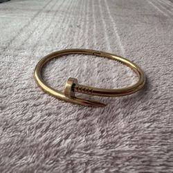Gold nail bracelet