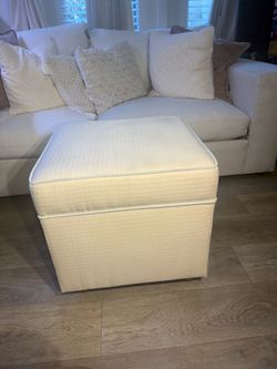 Ivory Upholstered Ottoman On Wheels With Hidden Storage