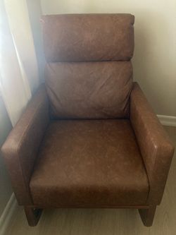 Faux leather brown rocking chair