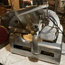 It’s a chrome, meat cutter, nice large side good for a food business