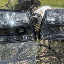 02-09 Chevy Trail Blazer Smoke Headlights Pair