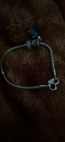 Pandora bracelet with two charms (bought for $395