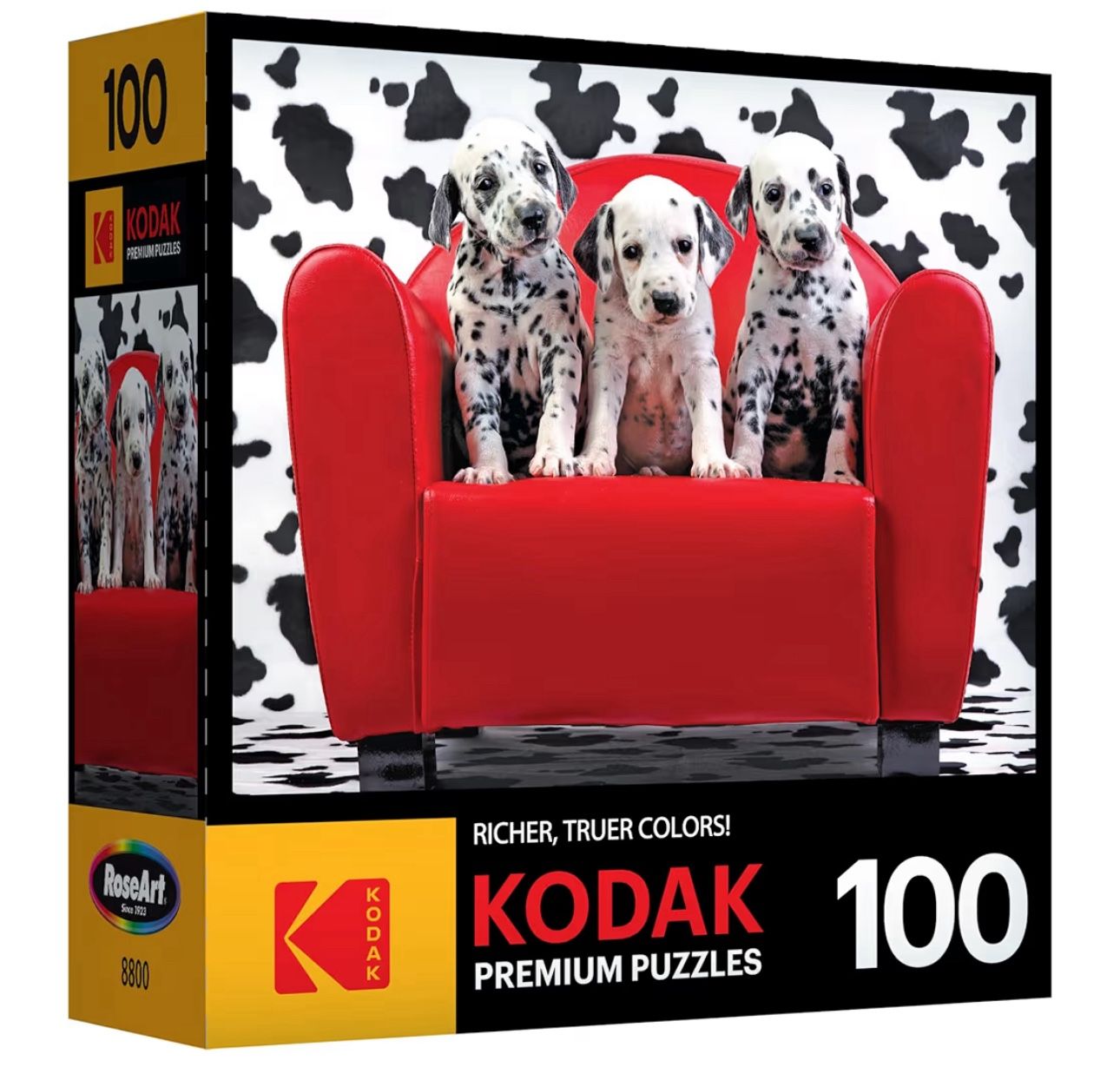 KODAK 3 Dalmatian puppies sitting on a bright red couch 100 puzzle piece.