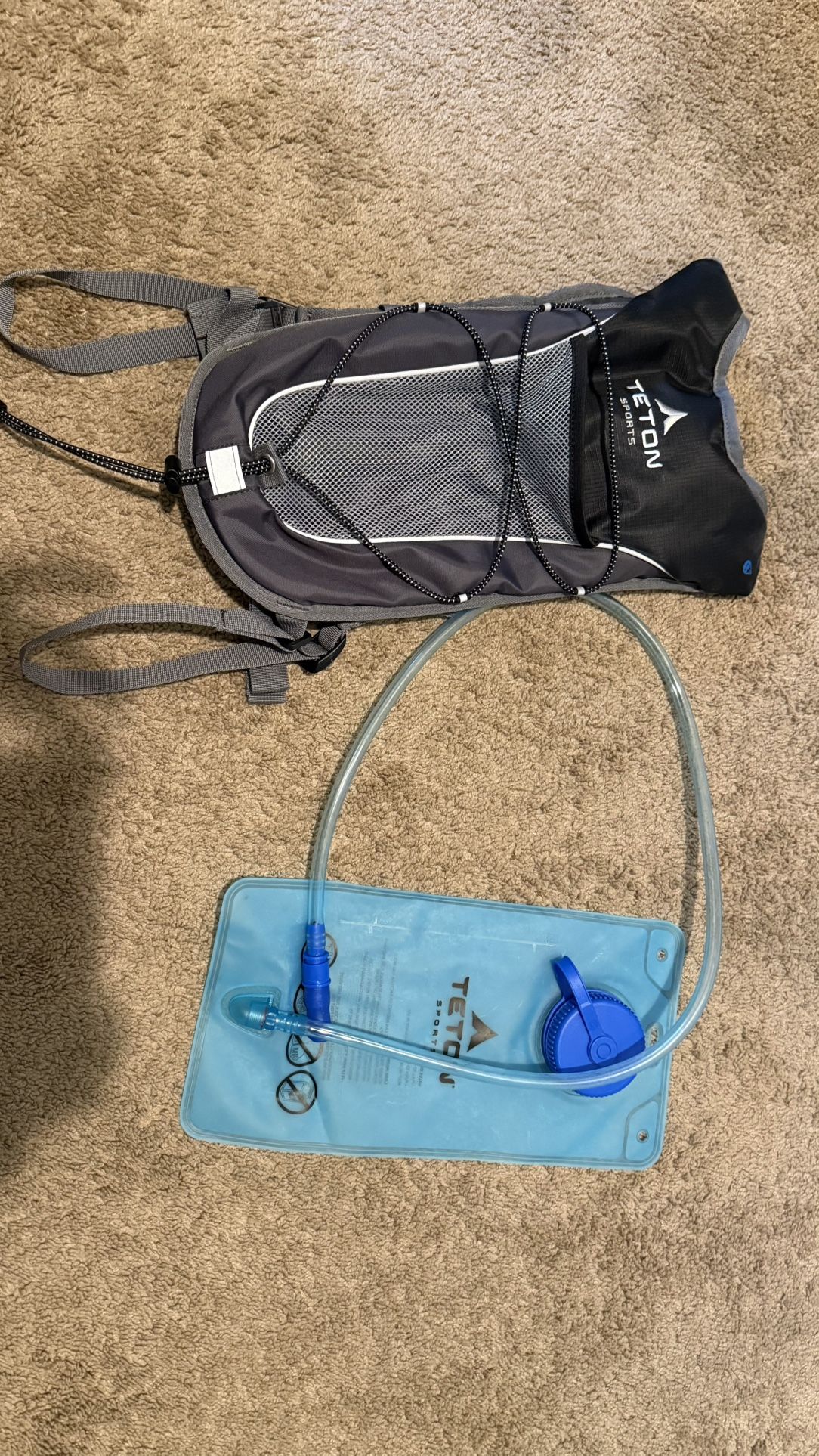 TETON Sports Hydration Pack with 2L Water Bladder – Lightweight Daypack for Hiking, Running, and Cycling