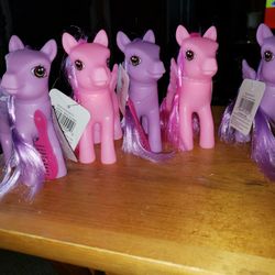 5 NEW  PONIES. EACH WITH THEIR OWN COMB