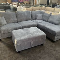New Soft Grey Sectional And Ottoman 