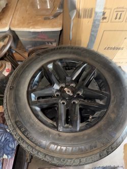 4 OEM Chevrolet 18-inch black wheels $850 OBO