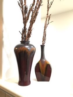 Decorative vases with stick thingy’s.