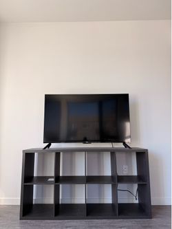 50’’ Roku TV ($180) and stand/shelf ($50)