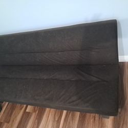 Futon and bookshelf 