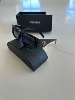 Prada Sunglasses with Gold Emblem