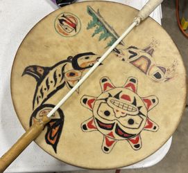 Northwest Coast First Nations elk-hide drum and beater with traditional art