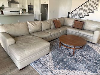 Living Spaces Leather sectional with chaise and extended length