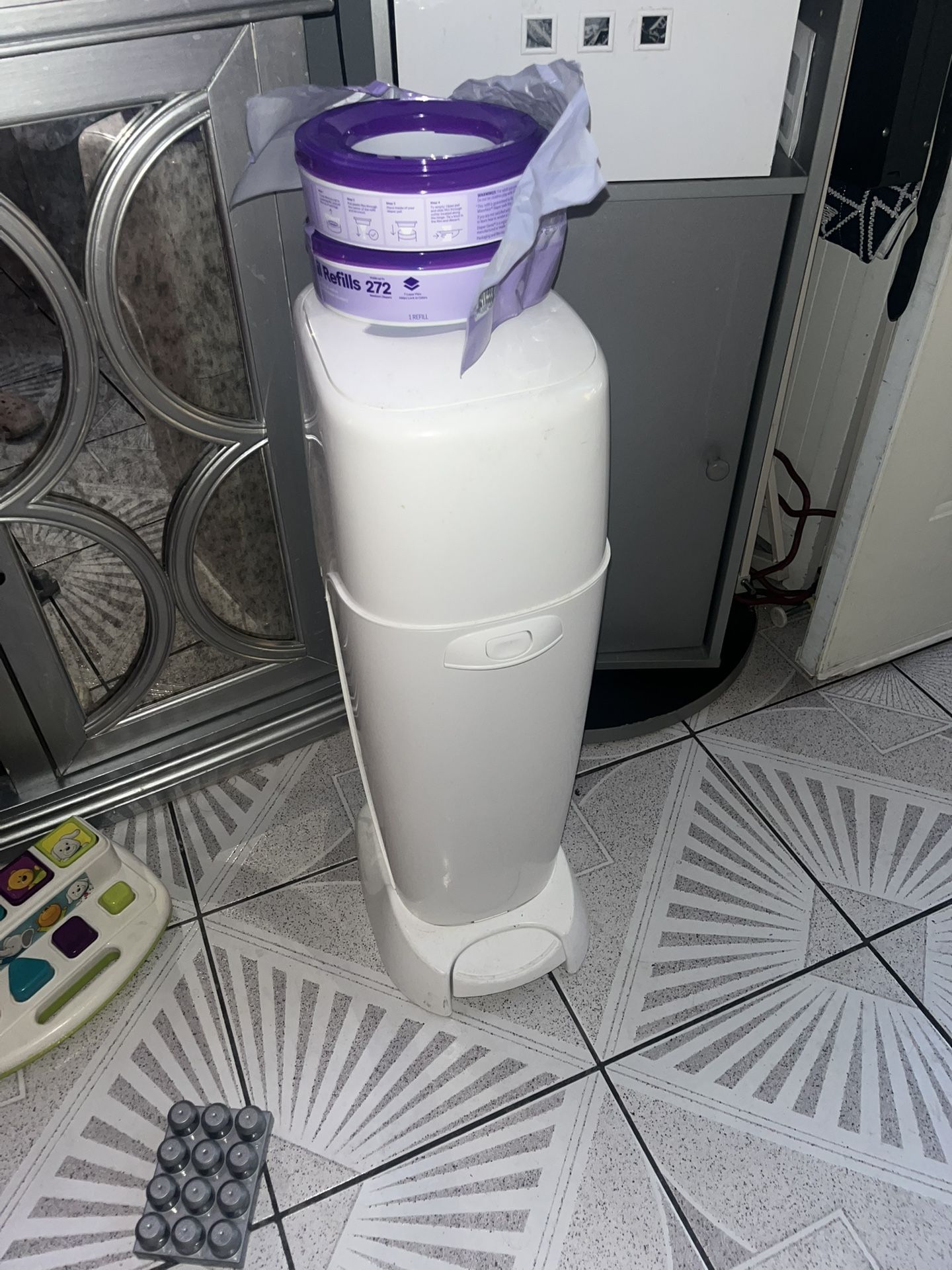 Baby Genie Trash Can With 2 Refills And Half Inside