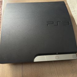 PS3 with controllers and games 
