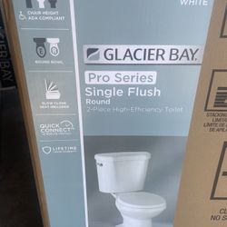 Glacier Bay 12 in. Rough In 2-Piece 1.28 GPF Single Flush Round Toilet in White, Seat Included