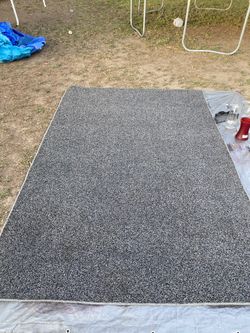 GREY RUG 20$ obo BROWN RUG 20$ obo