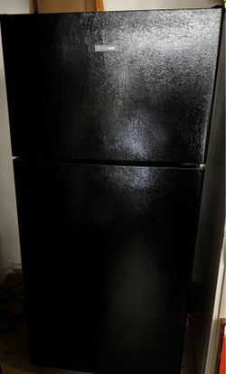 Refrigerator— like new.