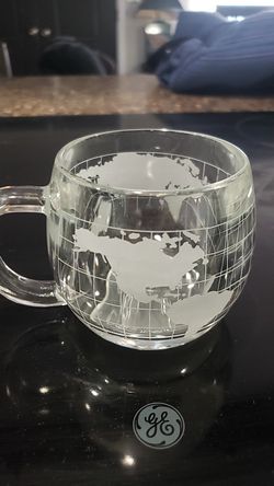 The Nestle Co Inc glass world mugs
