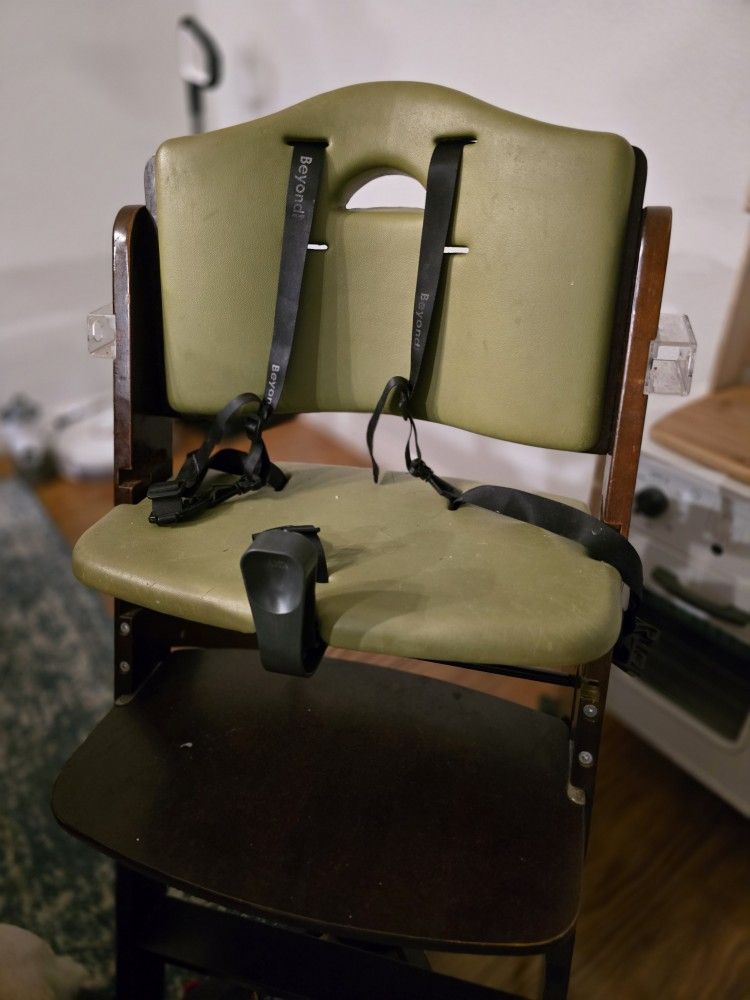 Abiie Beyond High Chair In Mahoney Olive
