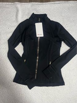 New Lululemon full jacket color black w gold zipper
