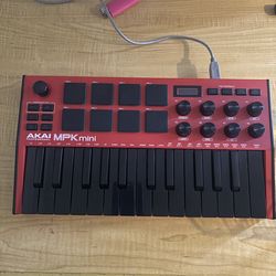 Akai professional mpk mini black and red pre owned Fair condition
