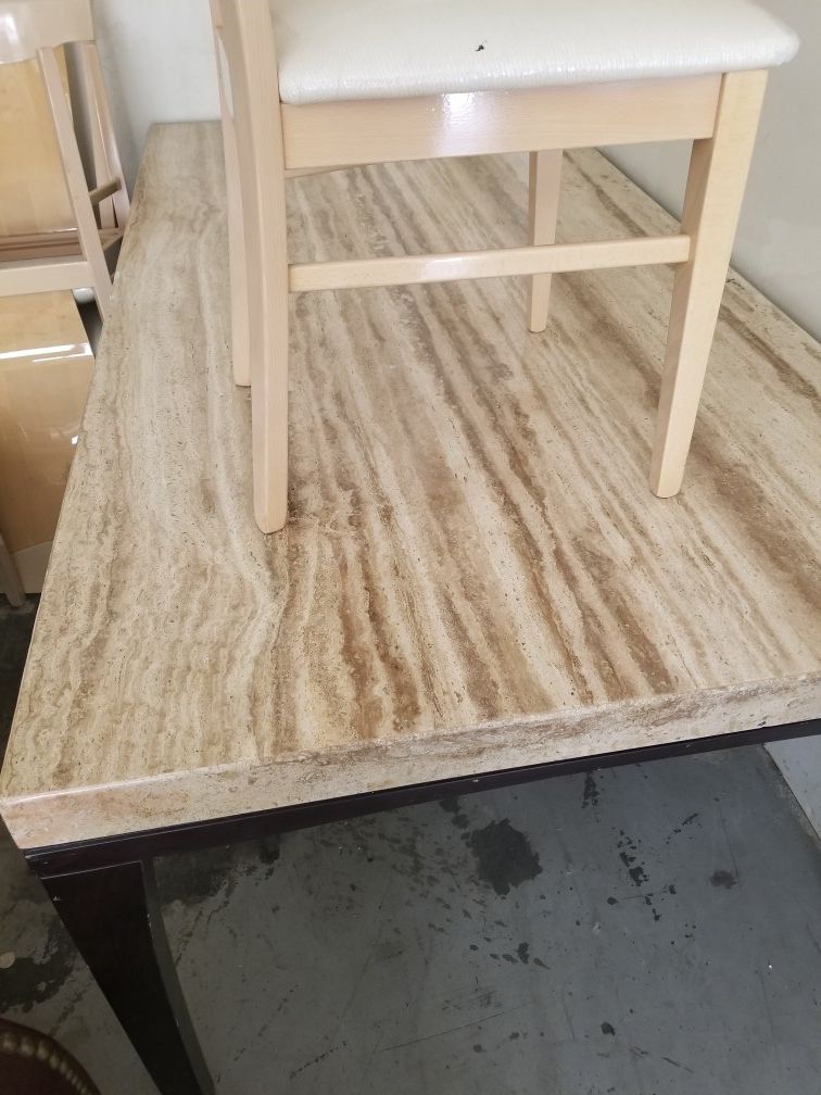 Beautiful Marble Table/ small chip. The table is being sold forv$500