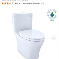 TOTO Aquia IV 12 in. Rough In 2-Piece 0.9/1.28 GPF Dual Flush Elongated Toilet Comfort Height in Cotton White Seat Included (60) V