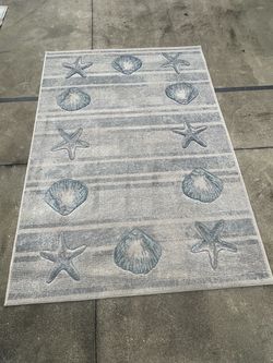 Coastal Seashell and Starfish Area Rug