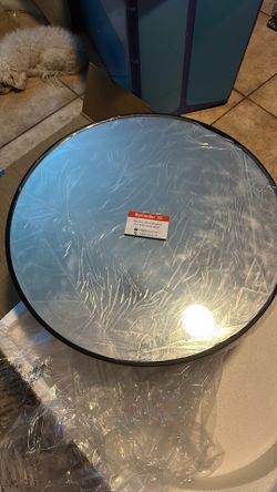 Round mirrored medicine cabinet