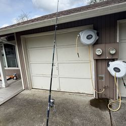 11’0 Olympic spinning rod and reel