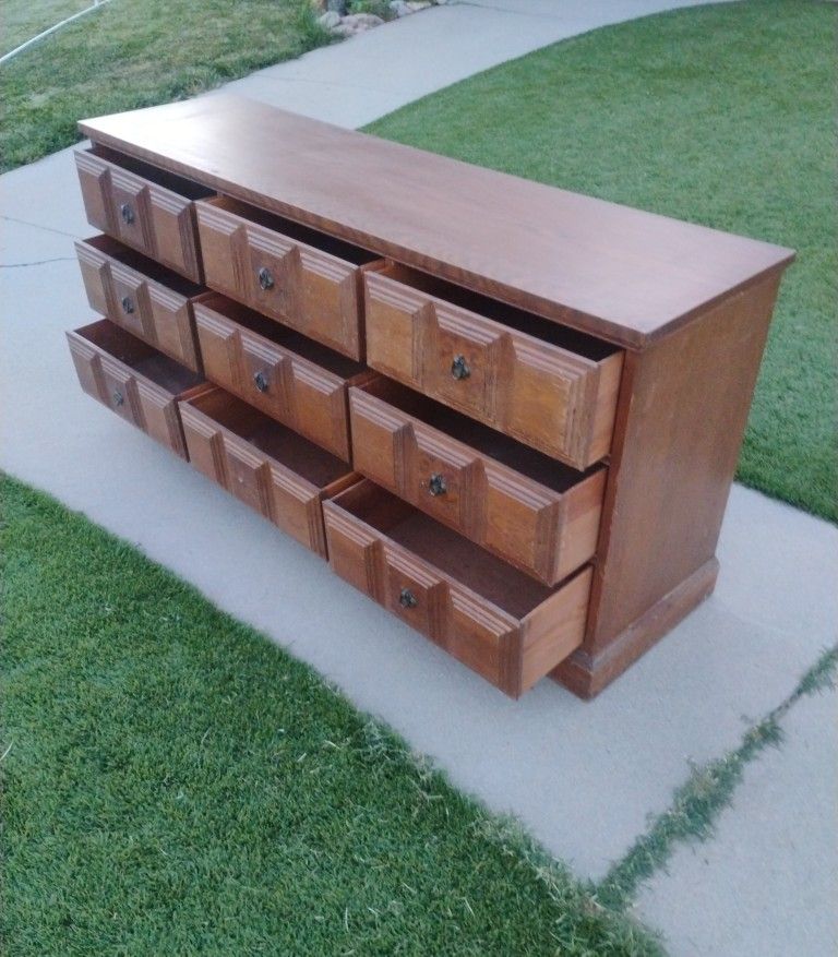 .Dresser Teak Wood from Sweden 10 Drawer Solid Wood Spacious Drawers 64" W X 17 3/4" D X 30" T 1 knob missing loop other missing . Pretty knobs can