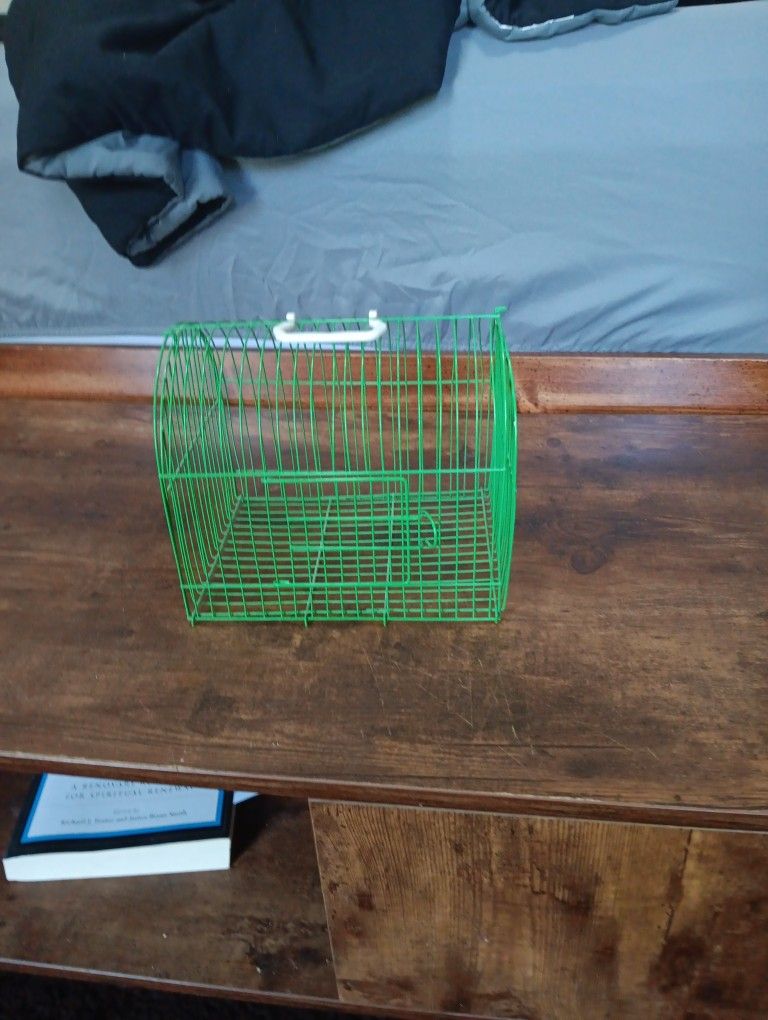 Small birdcage travel like to the vet or something if you need to carry your bird