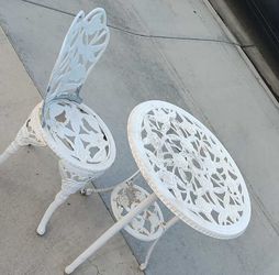 Grown iron table and chair ( As is) $85