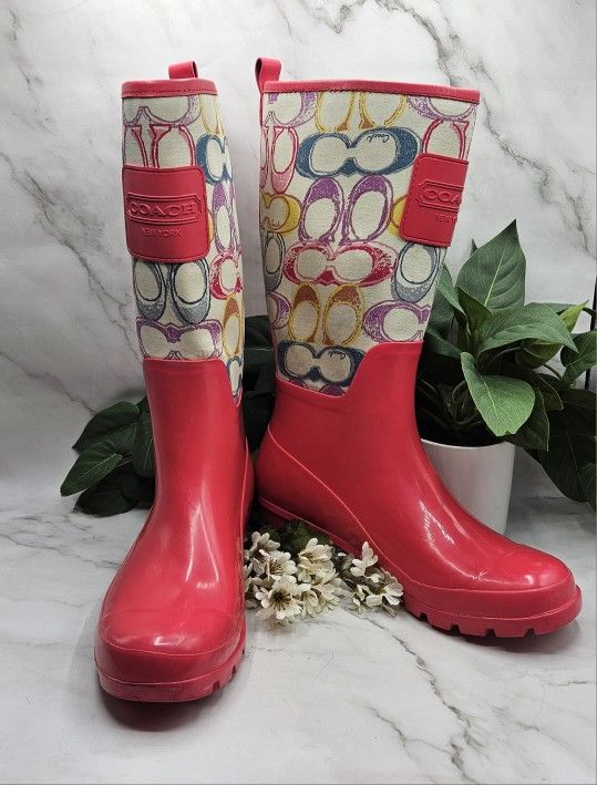 Coach 9B Pearl Dream Pink Multicolored calf Rain Boots approximate shaft 15 1/2", heel 1 1/2", 14"h there is some punching in fabric and the back of t