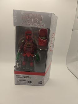 Star Wars Black Series Holiday Scout Trooper figure with Grogu accessory.