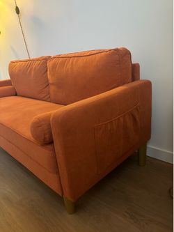 Orange love couch