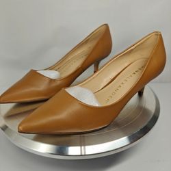 Size 7 US Athena Alexander brown kitten heel pumps featuring a pointed toe design