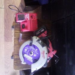 Milwaukee Circular Saw, Charger And Battery 125.00 Cash 