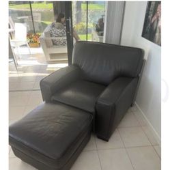 LEATHER CHAIR WITH OTTOMAN. EXCELLENT COND