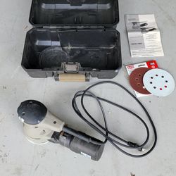 Porter-Cable Model 343 Random Orbital Sander.
It is a corded electric power tool operating at 120 V AC, 60 Hz, and 3 Amps. 
The motor delivers a no-lo